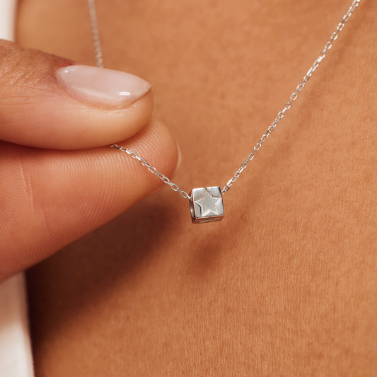 Saint Germain Felie 14 karat white gold cube charm with star - - Isabel Bernard