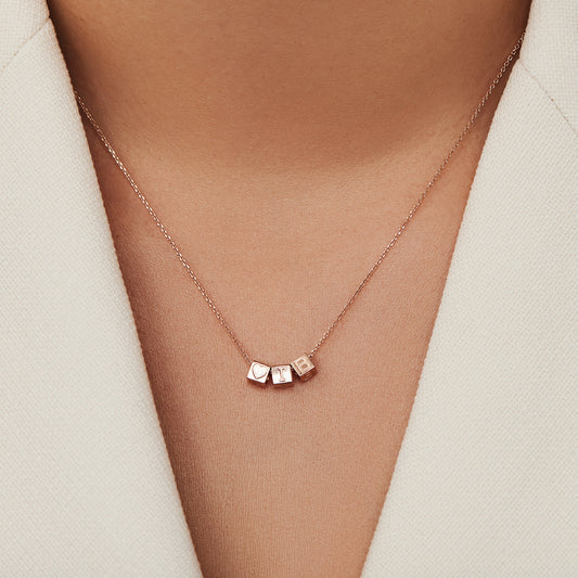 Cadeau d'Isabel 14 karat rose gold necklace and cube initial charm - - Isabel Bernard