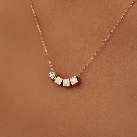 Cadeau d'Isabel 14 karat rose gold necklace and cube charm with heart - - Isabel Bernard