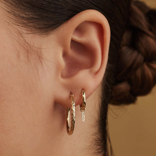 Rivoli Laura 14 karat gold hoop earrings with diamond cut rod - - Isabel Bernard