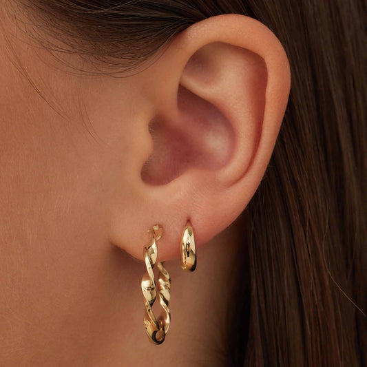 Rivoli Odette 14 karat gold hoop earrings with twist - - Isabel Bernard