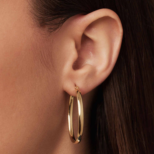 Rivoli Flori 14 karat gold oval hoop earrings (34 mm) - - Isabel Bernard