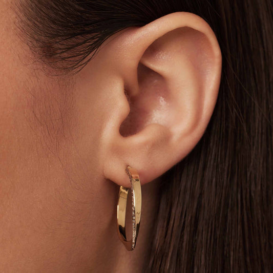 Rivoli Laura 14 karat gold hoop earrings with diamond cut (24 mm) - - Isabel Bernard