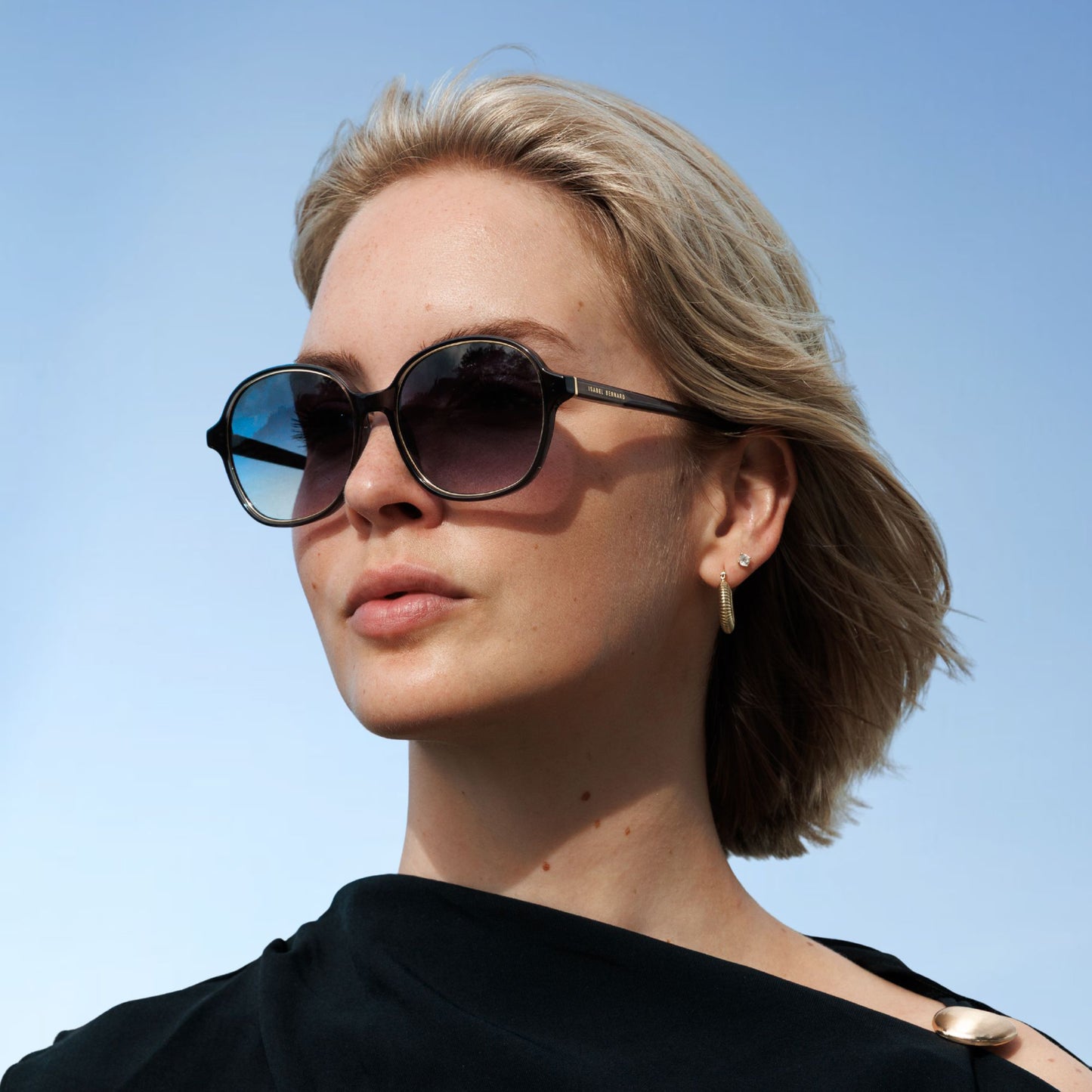 La Villette Eva transparent grey oval sunglasses with blue lenses - - Isabel Bernard