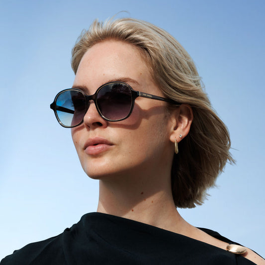 La Villette Eva transparent grey oval sunglasses with blue lenses - - Isabel Bernard