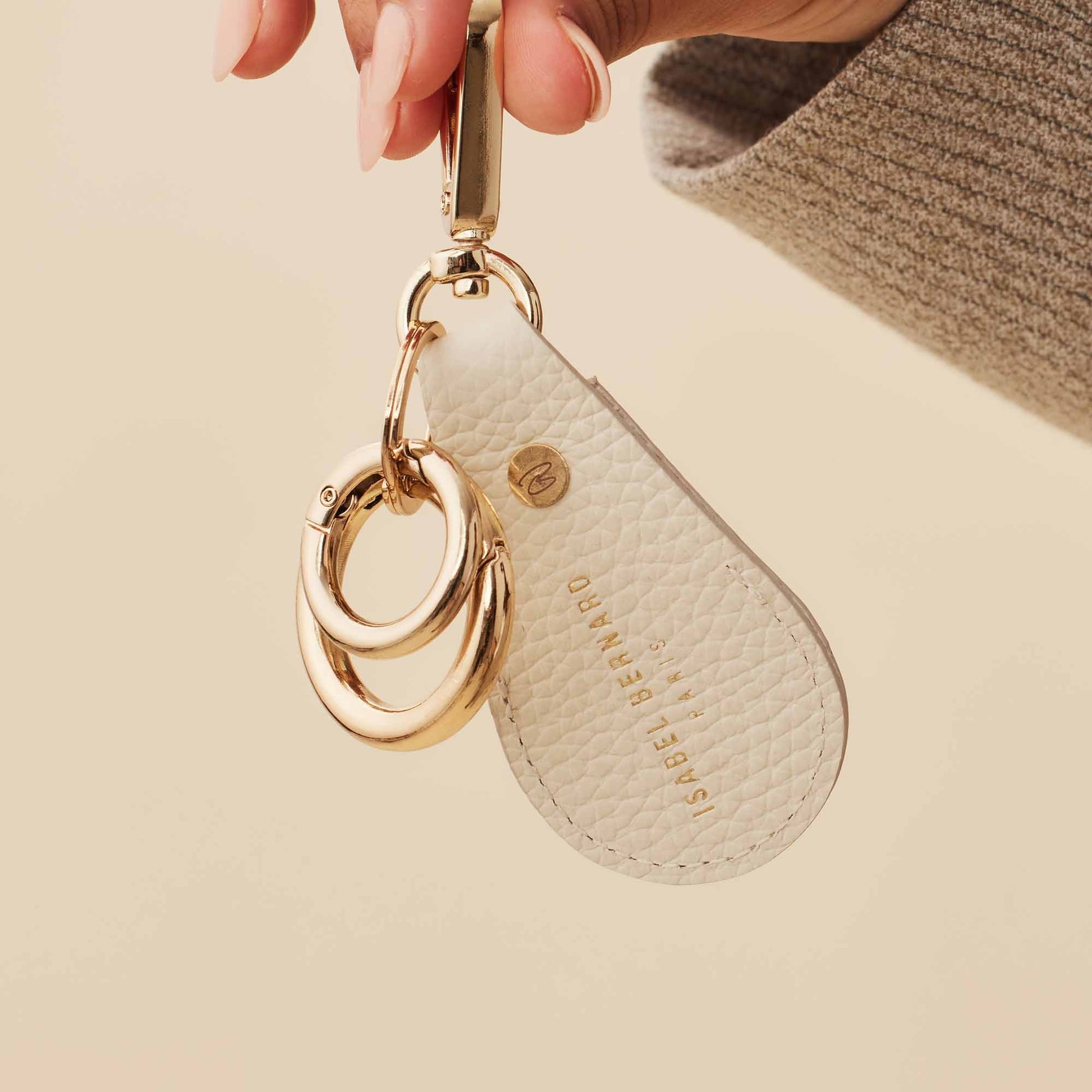 Honoré Filou cream Airtag key ring - - Isabel Bernard