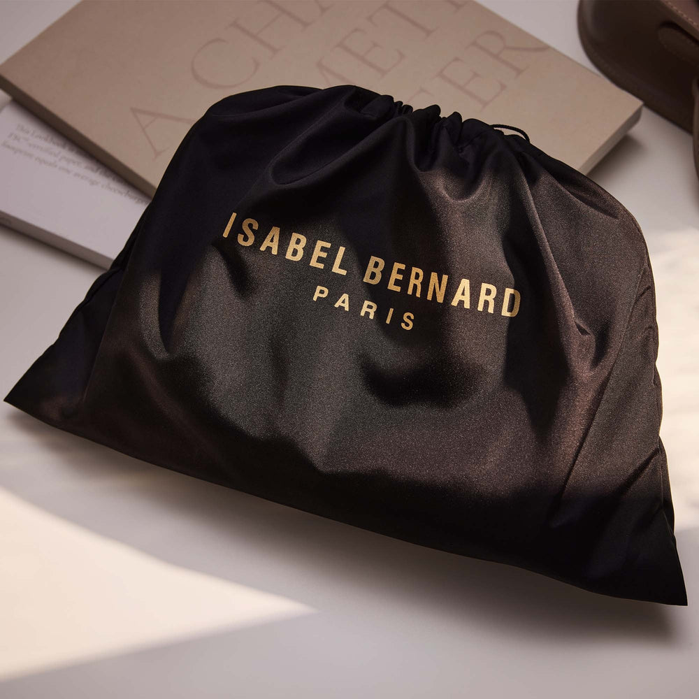 Detailansicht der Honoré Anique Handtasche mit Verpackung